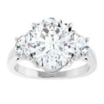 Spectacular 3.85-carat oval diamond engagement ring with half-moon side stones, set in platinum, an example of the high-quality custom bridal jewelry from Catawba Island Jewelers in Port Clinton, Ohio.